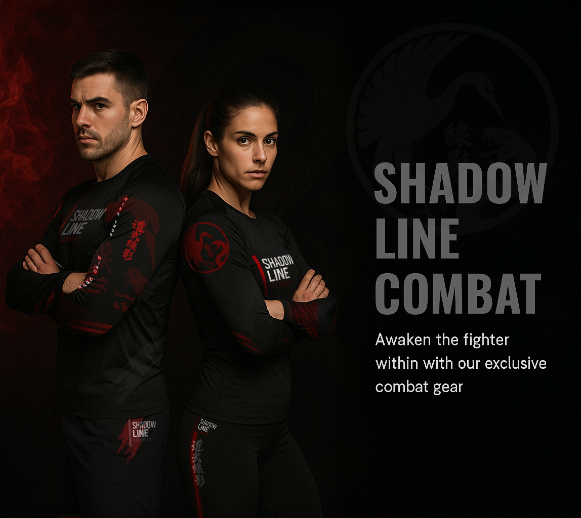 Two martial artists—a man and a woman—standing back to back in red‑and‑black rash guards and combat pants, arms crossed, against a dark background. Beside them is bold white text reading ‘SHADOW LINE COMBAT.